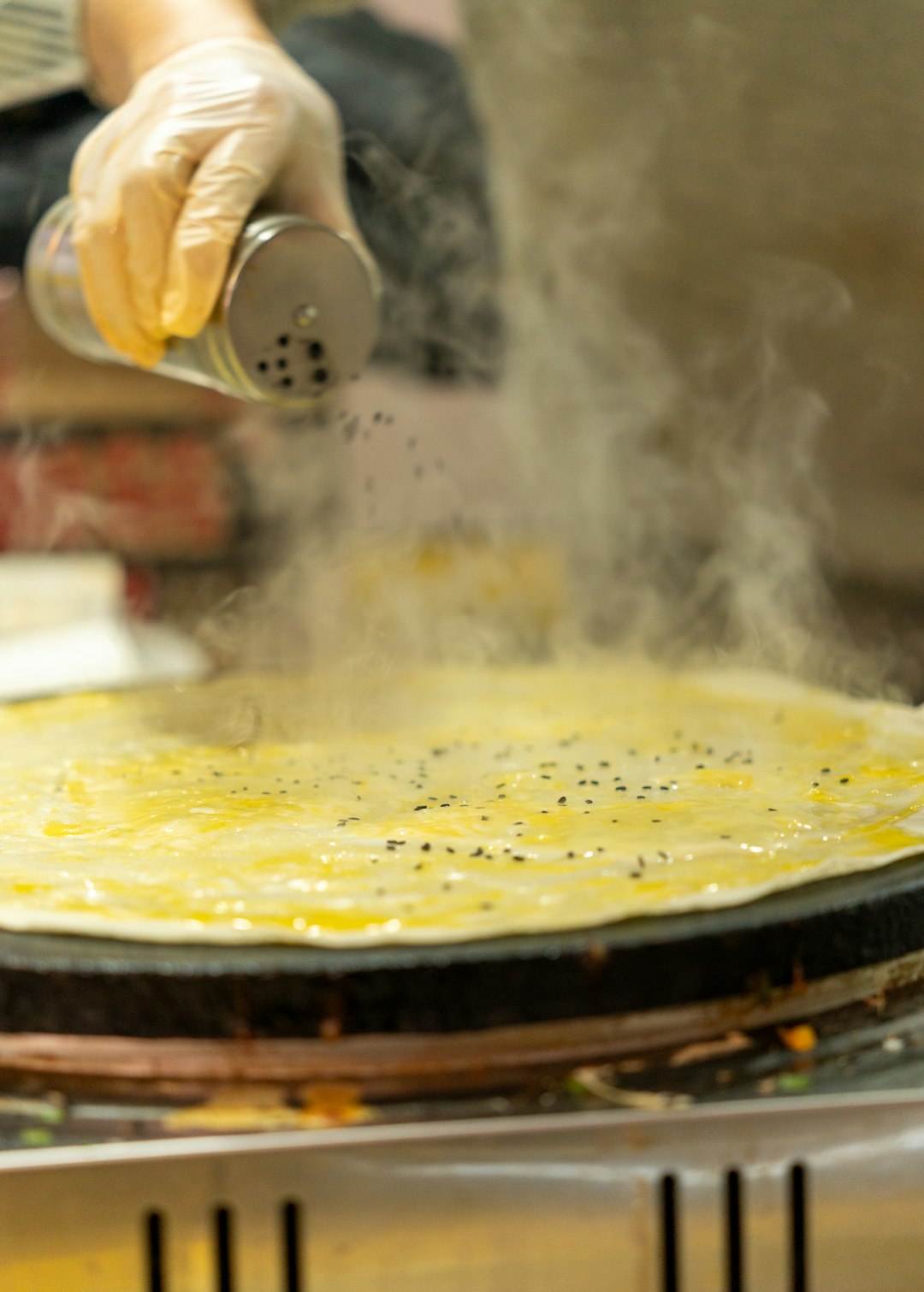 Fresh Injera Crepe preparation with spices